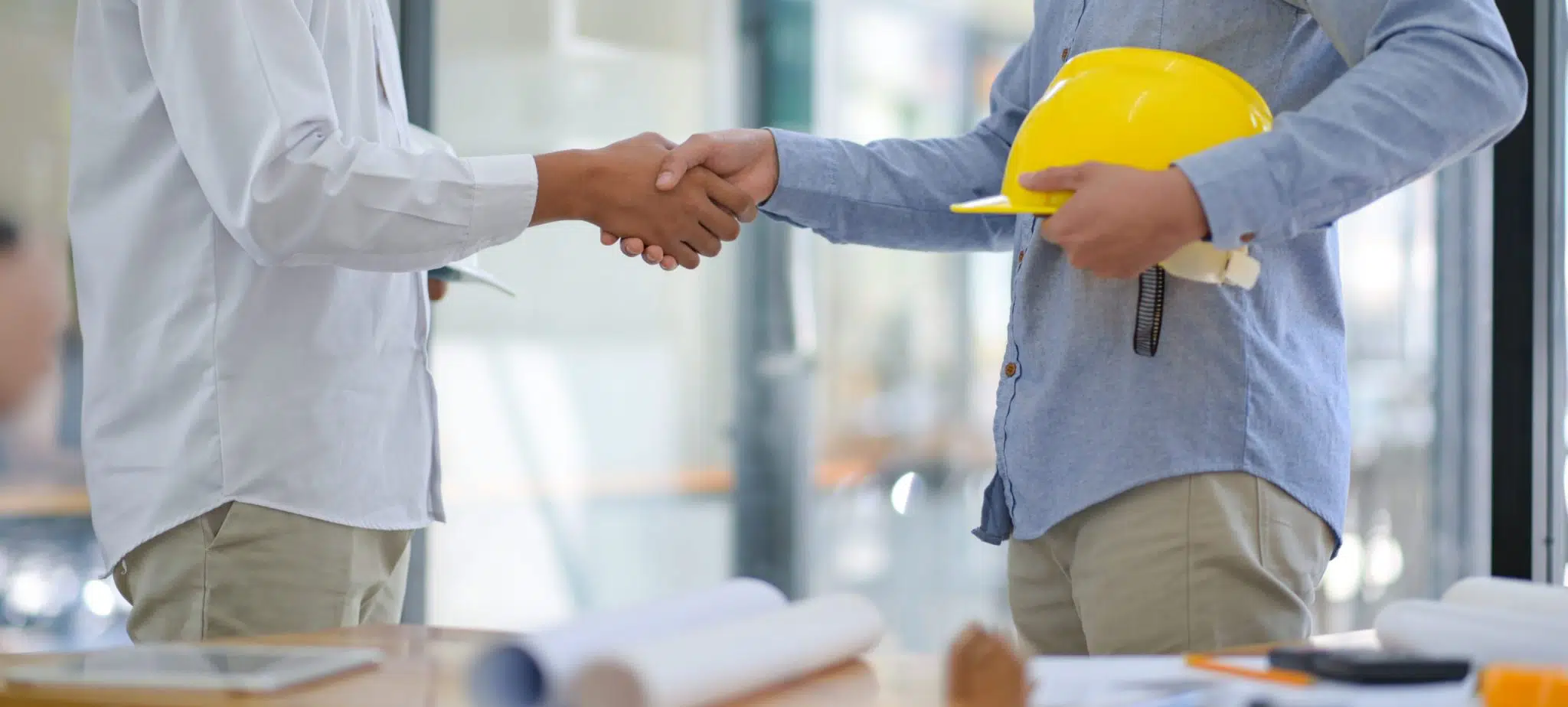 architects-and-contractors-shake-hands-to-work-FDM7NDA-scaled-1-2048x924.jpg-1